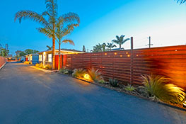 Beautiful Exterior with LED Lighting and Chic Fence